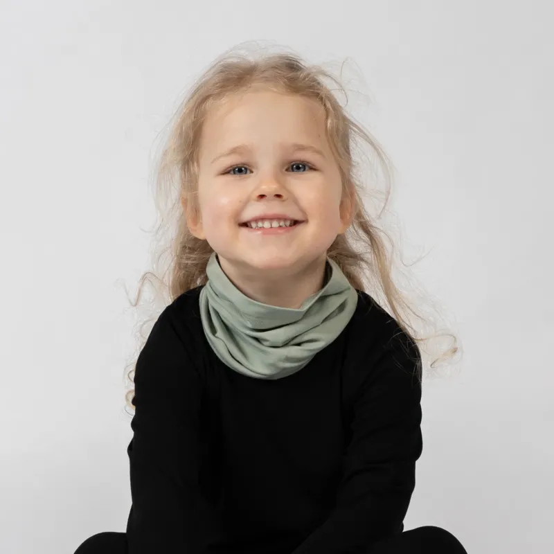 Kids bamboo neck gaiter in sage green, lightweight breathable accessory for layering.