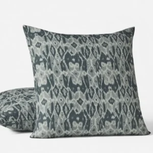 Coyuchi Cavallo Print decorative pillow in slate blue ikat pattern, two sizes shown.