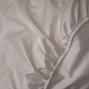 Warm and buttery LETTO Americano Cotton Sateen fitted sheet in color white, made in Italy of American grown Supima cotton.
