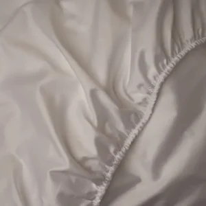 LETTO Sea Island Sateen fitted sheet in ivory with elasticated corner detail.