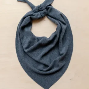 TBCo Large Merino Triangle Scarf in charcoal grey, elegantly draped and knotted to showcase its soft wool texture and versatile styling