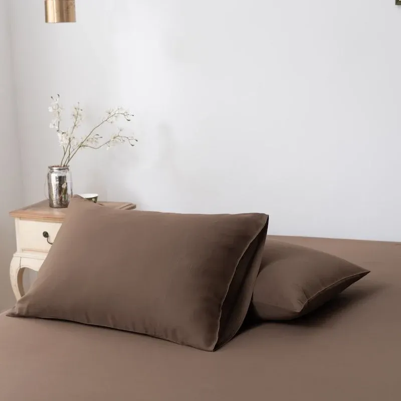Coffee Brown bamboo pillowcase styled on a bed in a bedroom setting