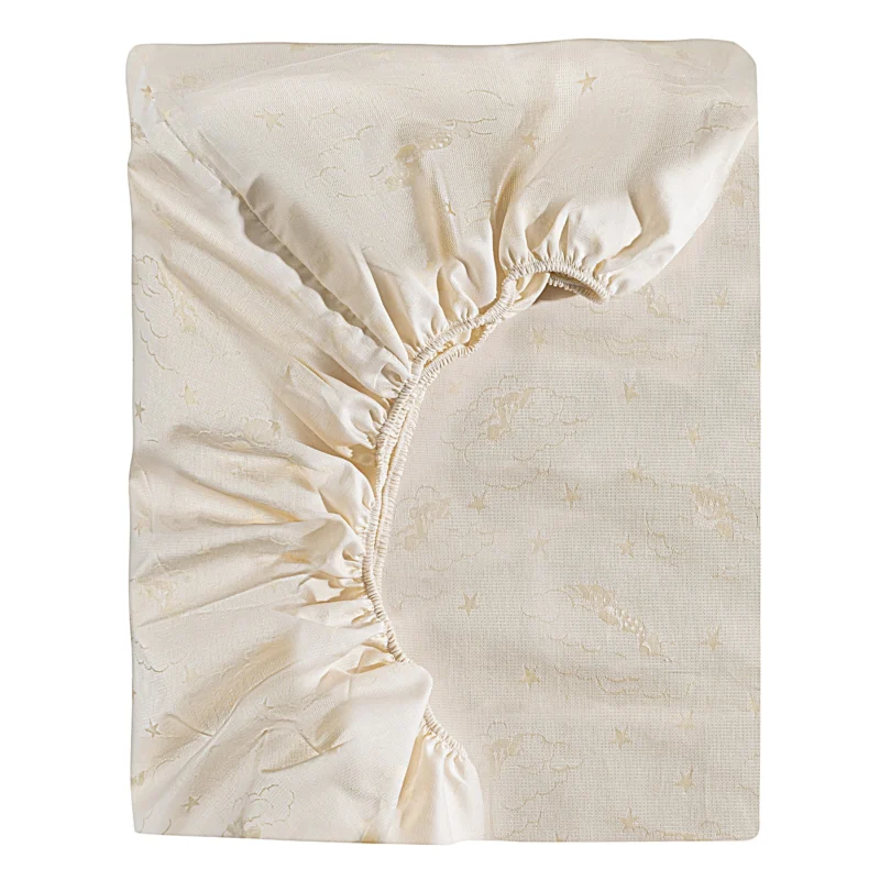 Home Treasures Sweet Dreams ivory fitted crib sheet with delicate jacquard pattern.
