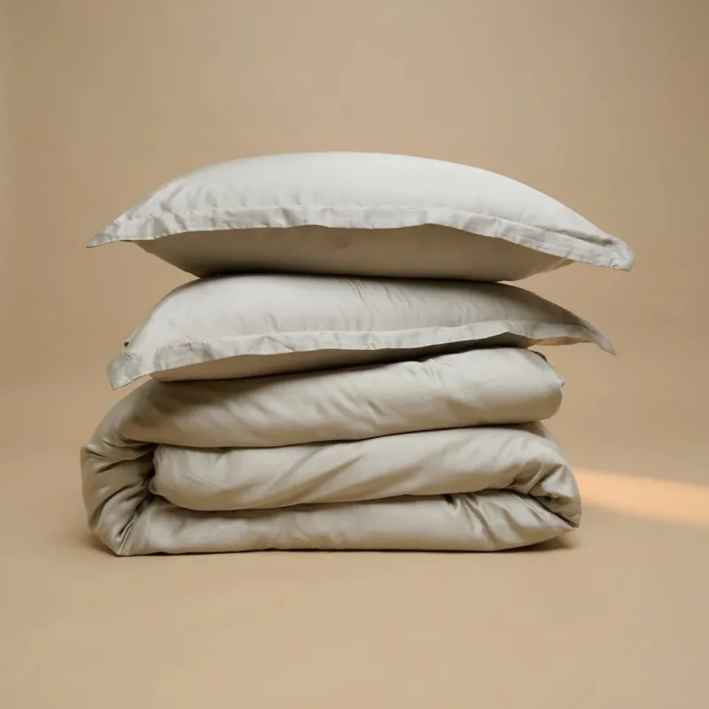 Tencel™ Sateen Duvet Cover and pillow in Taupe, folded